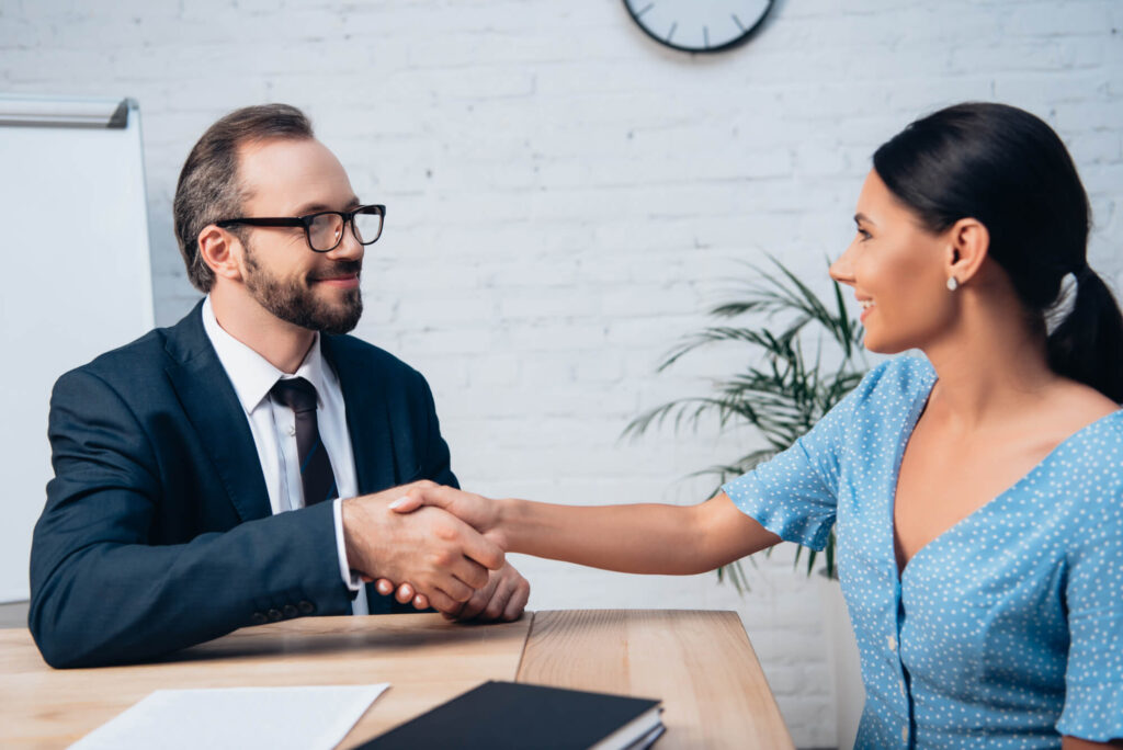 lawyer-shaking-hand-with-client